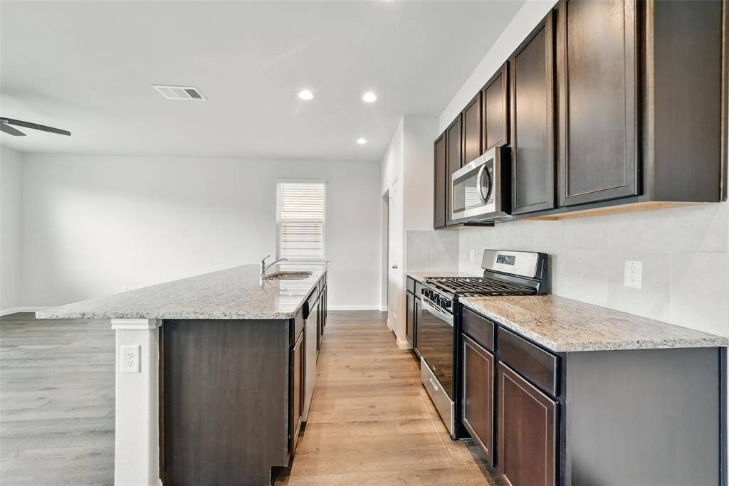 Modern appliances and gas stove top