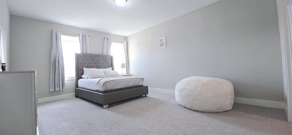 Large secondary bedroom upstairs perfect for family members