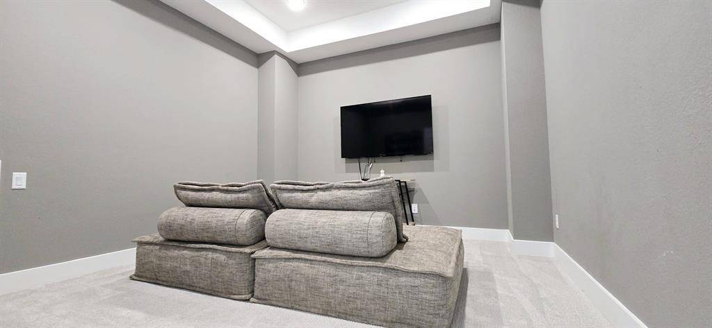 A dedicated media room designed for immersive entertainment experiences.