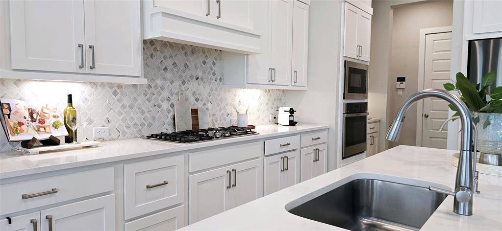 Back splash adds a touch of elegance and under cabinetry lighting