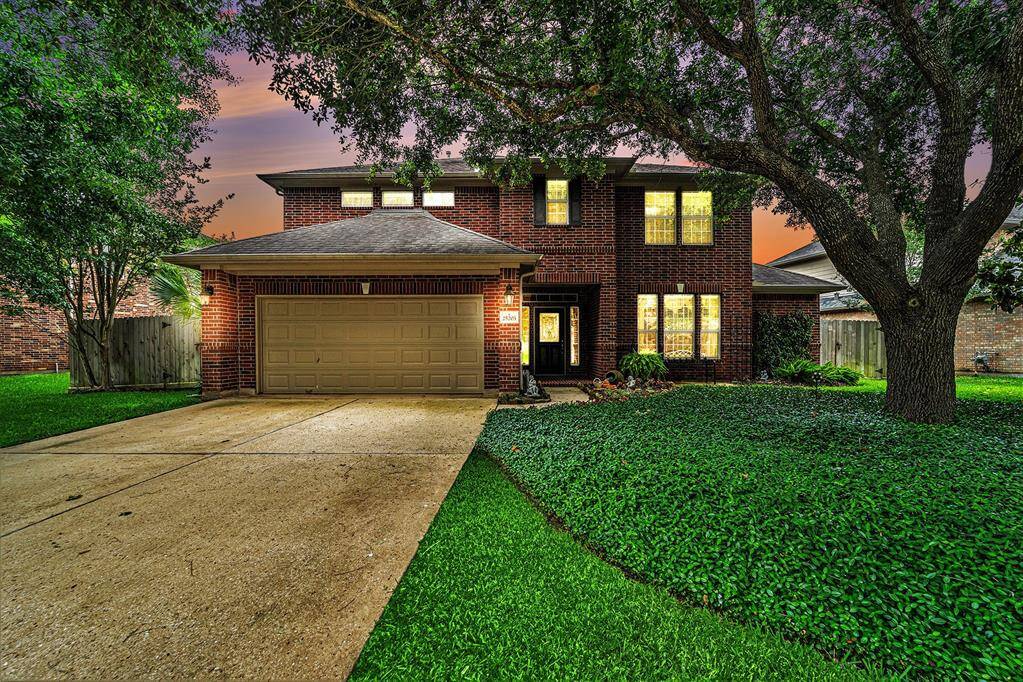 Welcome home to 25203 Hamden Valley Drive nestled in the gated community of Canyon Gate at Westheimer Lakes!
