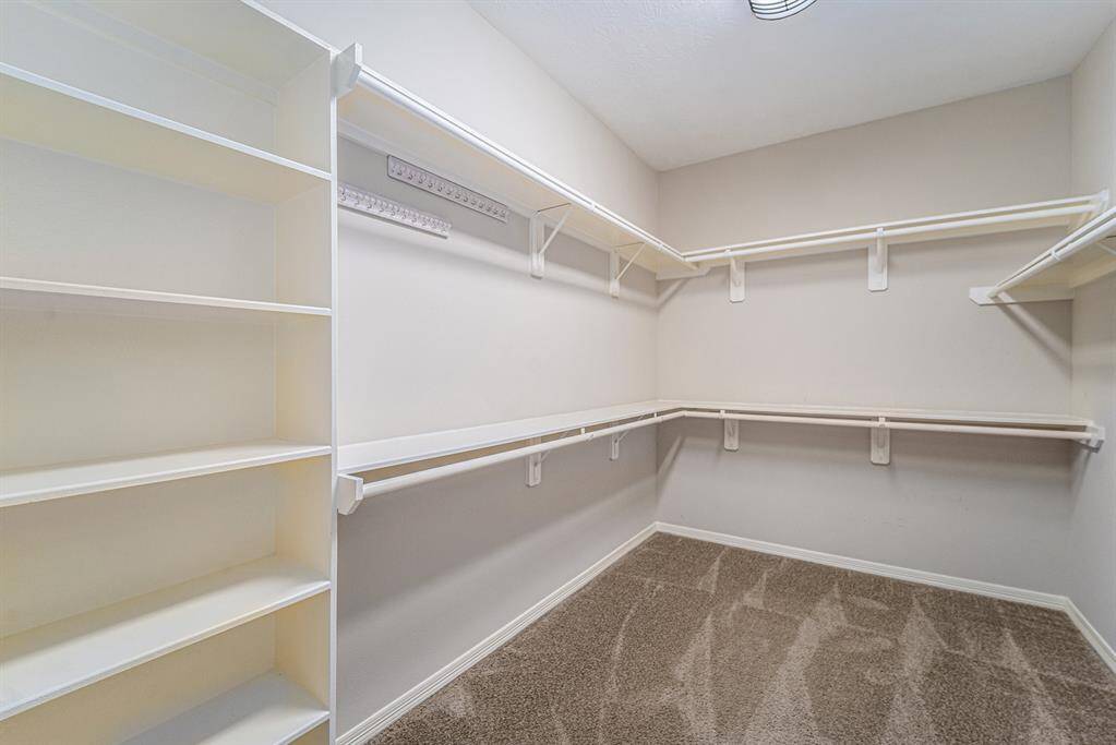 This primary features two closets offering plenty of storage space for all your needs!