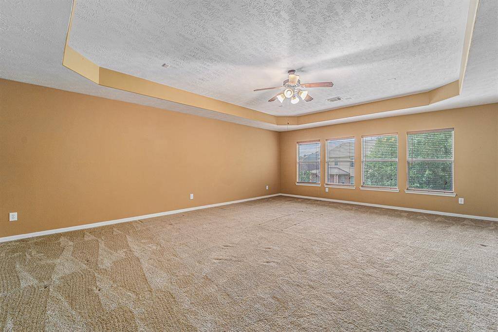 As we venture upstairs, you land on this HUGE game room ready for play action!  There is enough room for an area of lounging and enjoying gaming, and a pool table or play area!  Fun for all!