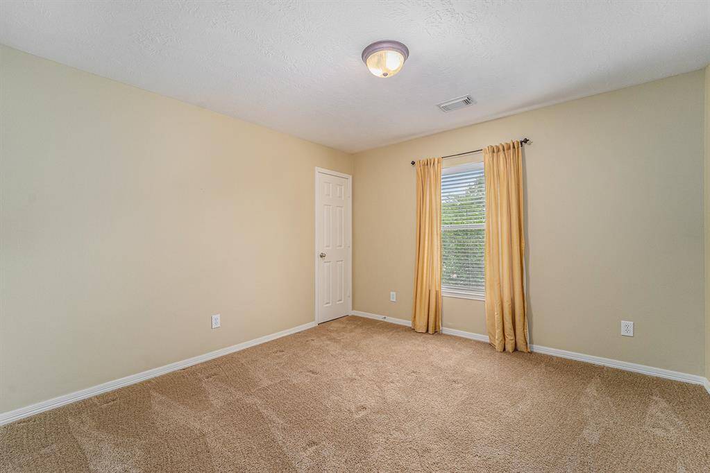 This home features 3 secondary bedrooms upstairs, each with their own character and charm!