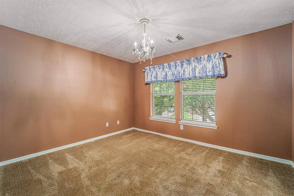 And last but not least, a secondary bedroom with views of the trees!