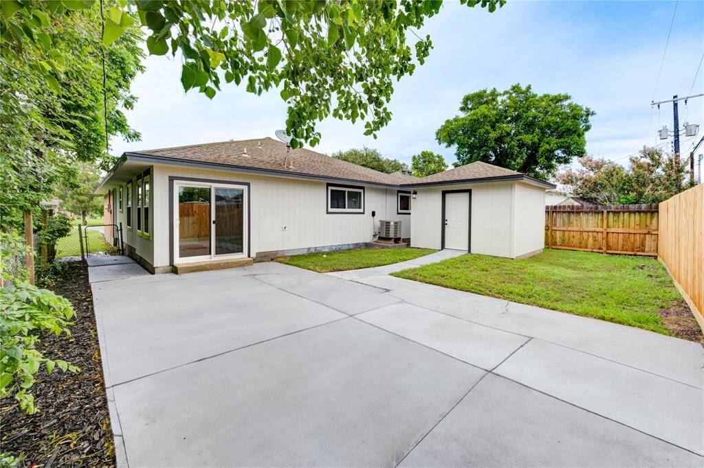 Backyard with storage shed or your new she shed!