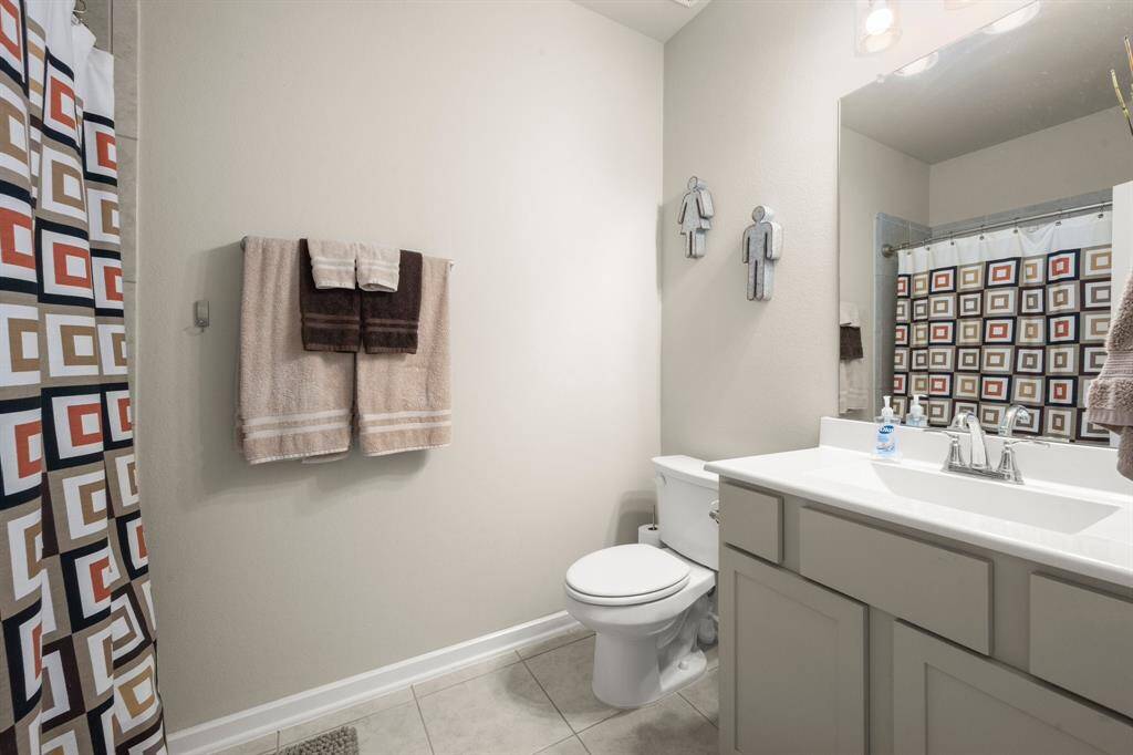 Secondary bathroom serves the gameroom and 2 bedrooms on the first floor.