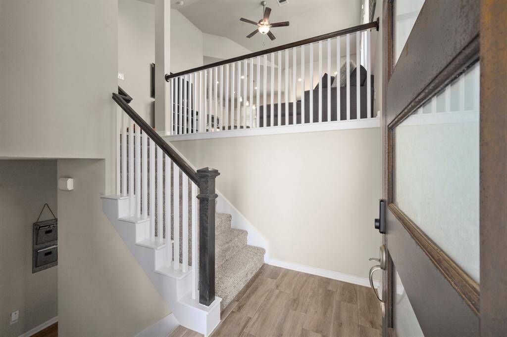 Split plan with gameroom and 2 bedrooms on the 1st floor and living spaces and primary on the 2nd.