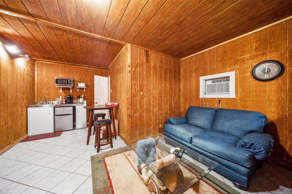 1/1 Barn Apartment showing kitchenette and ac/heat window unit