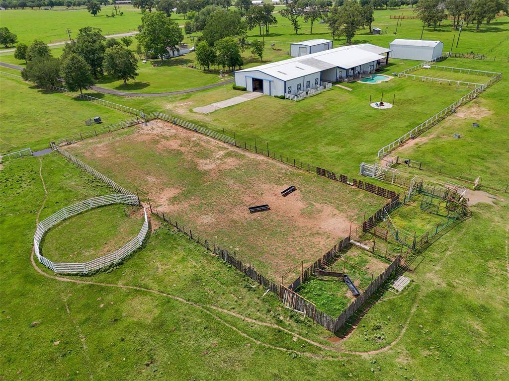View of arena, round pen, and cattle pens