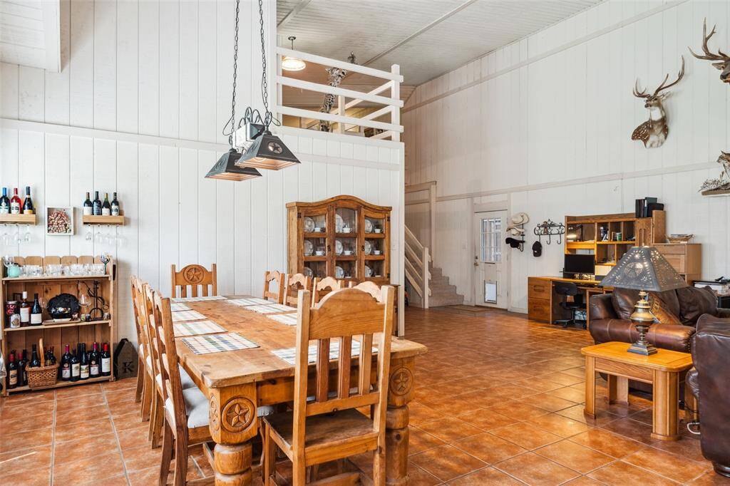 Dining area with view of upstairs loft