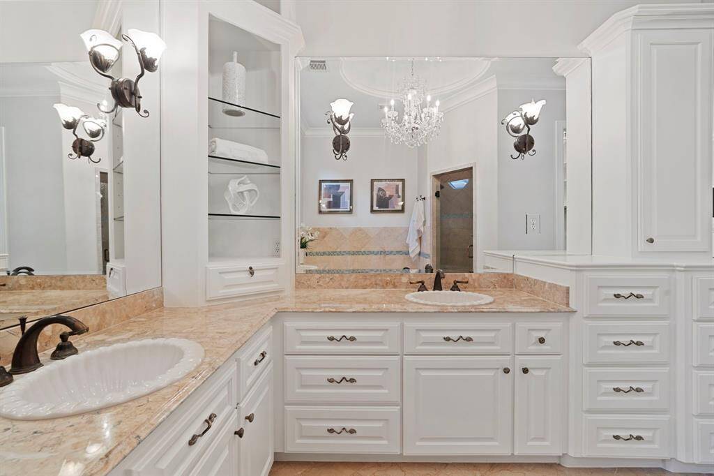 The primary bathroom has plenty of storage space.