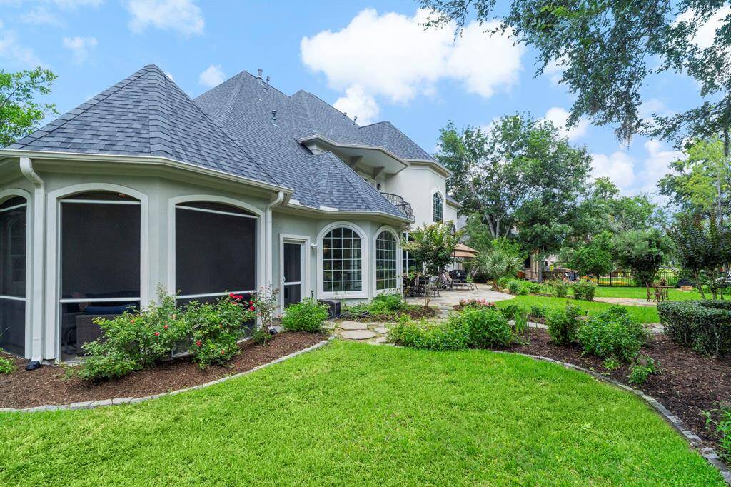 The backyard has plenty of green space!