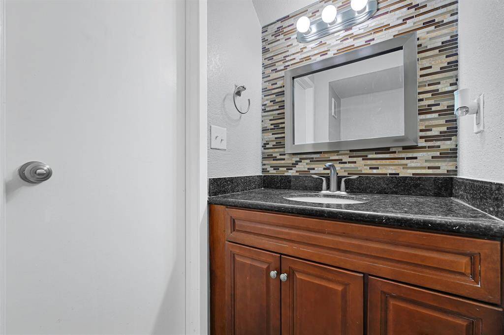 Half bath downstairs off of living room.