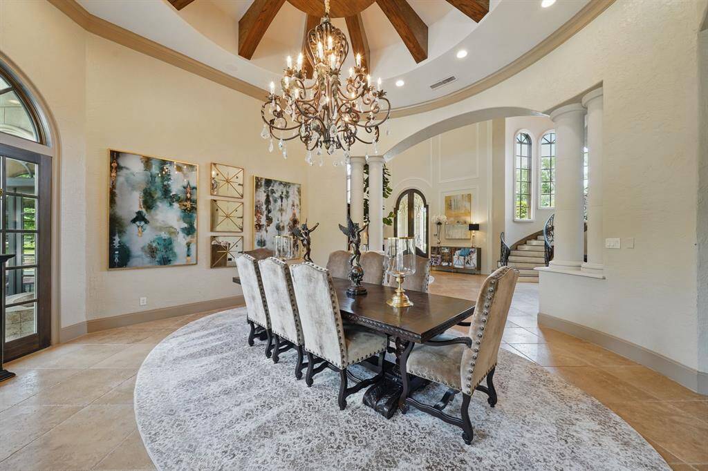 The room is enhanced by acaptivating chandelier.