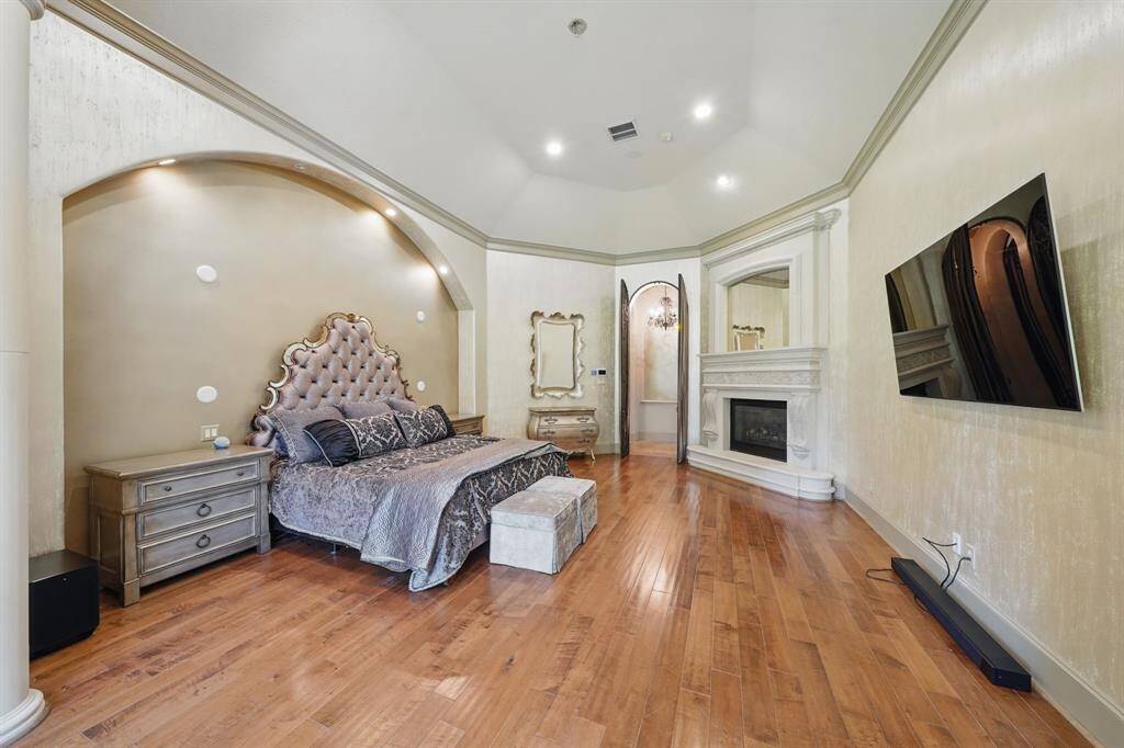 Large windows grace the room allowing natural light in and the fireplace provides comfort and warmth!