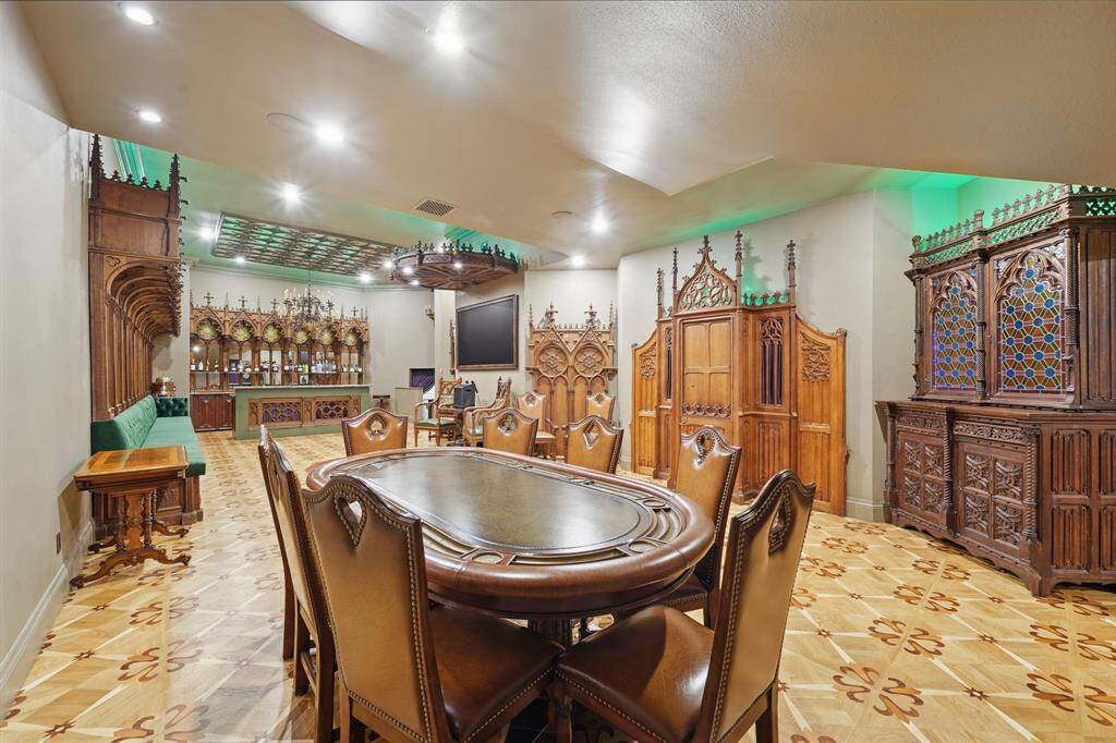 Welcome to the speakeasy featuring high ceilings, recessed lighting, dart room, and more!