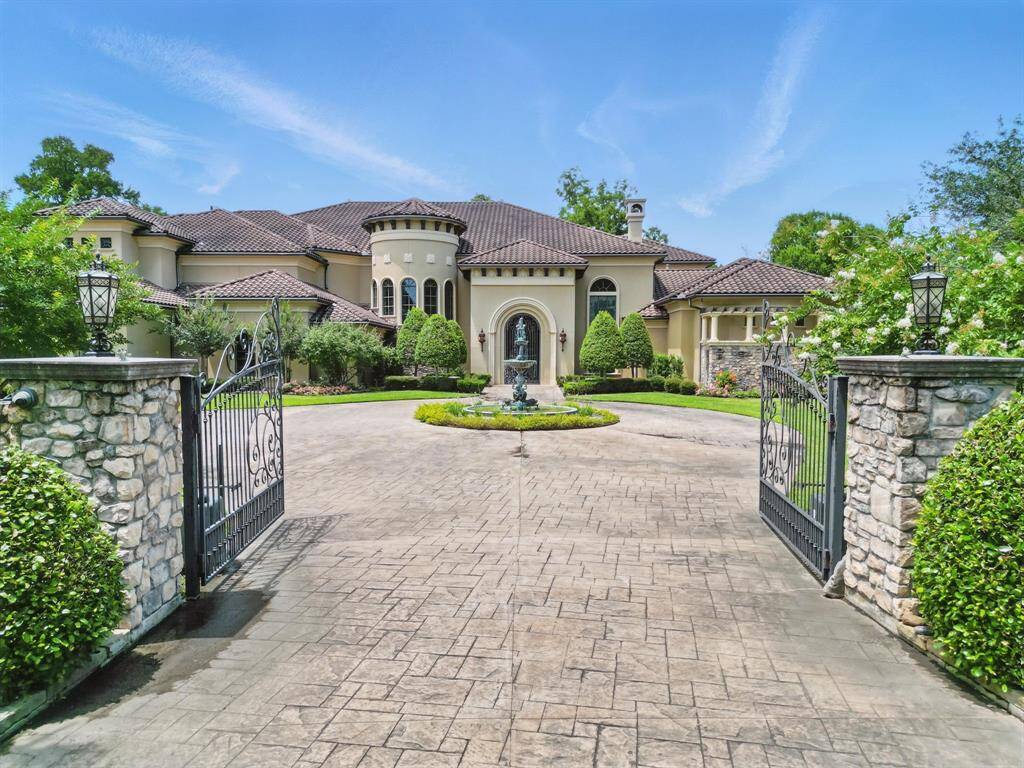 The gated entryway ensures apeaceful and private atmosphere and the circle driveway provides plenty of parking space.