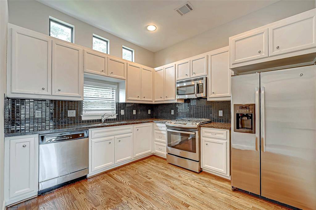 Large open kitchen with SS appliances