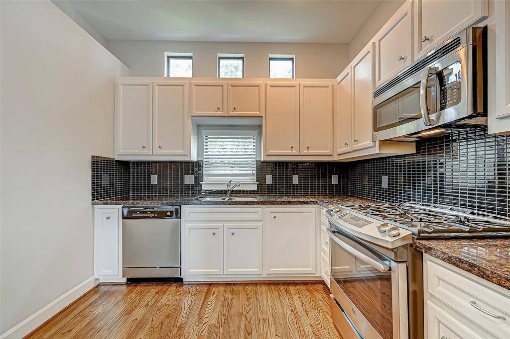 Another view of the kitchen with a window to bring in light