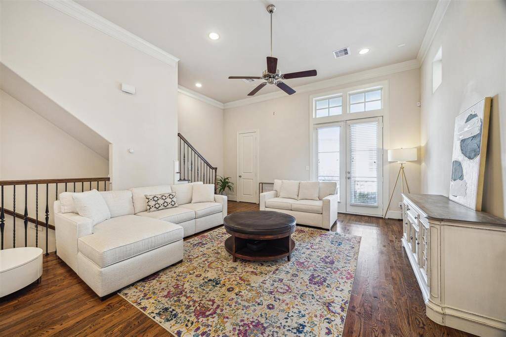 Large living room with high ceilings.