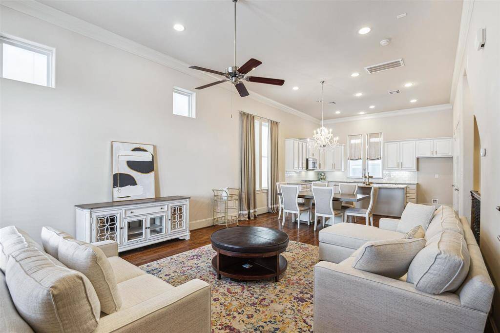 Natural light pours into the living room.