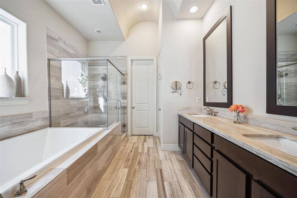 Separate shower and soaking tub.
