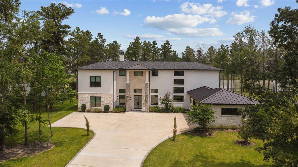 Welcome home! Step into a masterpiece of design and craftsmanship with this breathtaking story estate, perfectly positioned on a scenic lakefront lot.