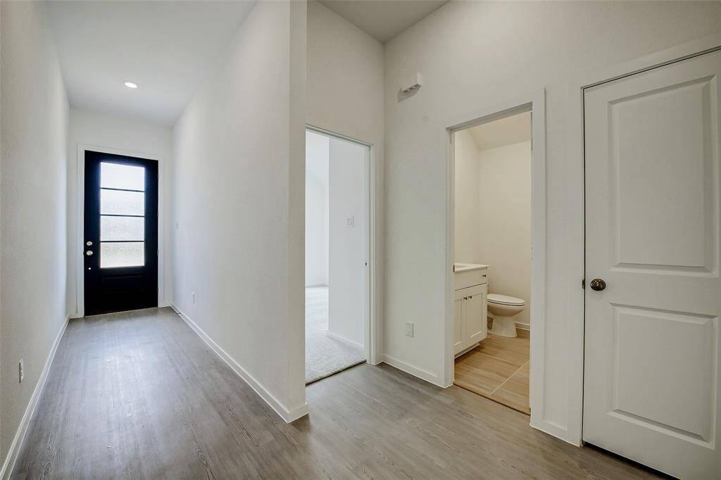 Functional layout with easy access to bedrooms and bathroom off the hall