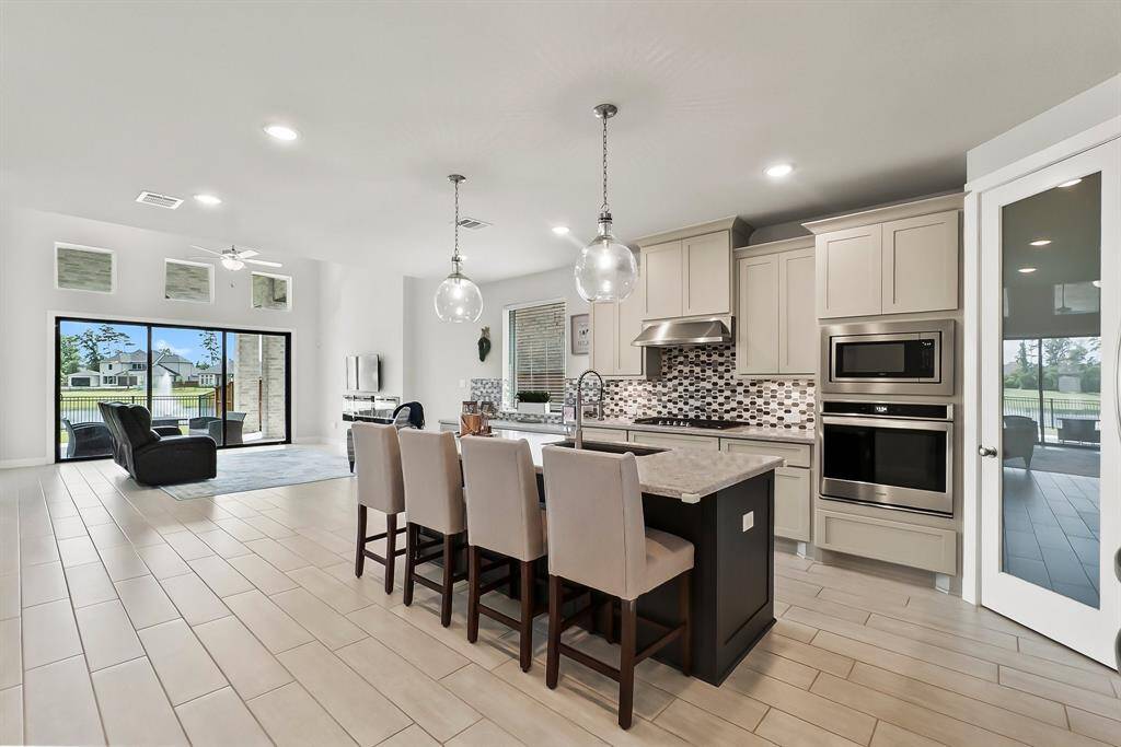 The kitchen opens into the family room