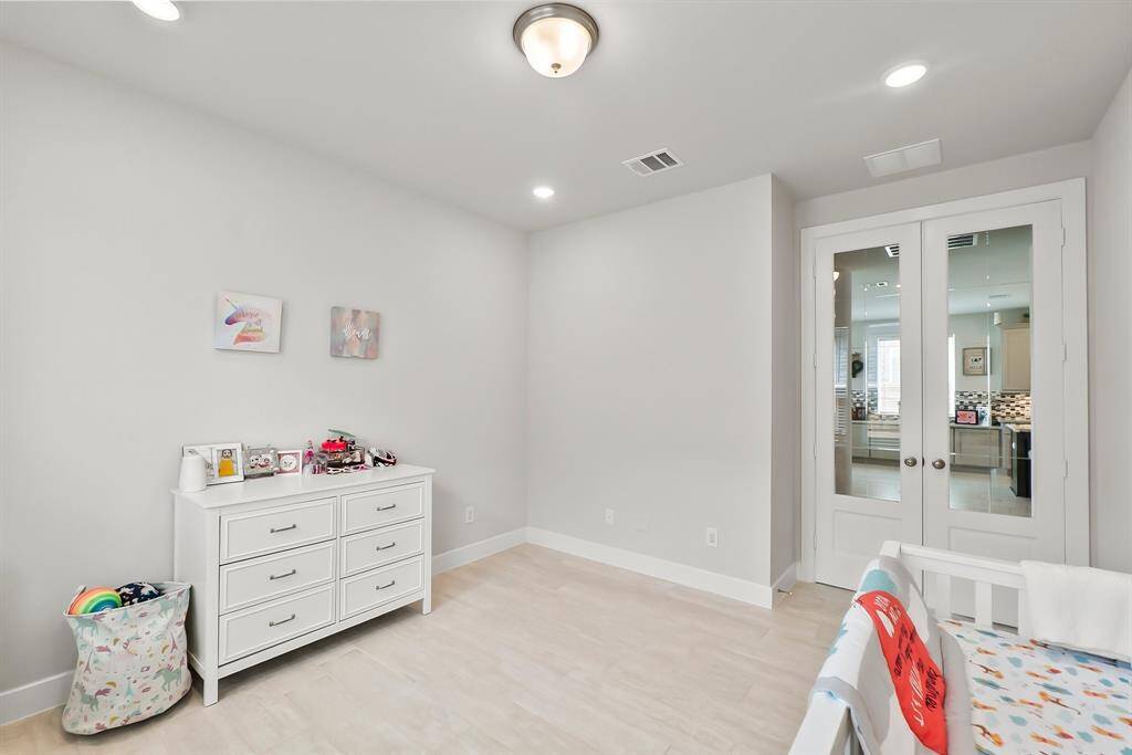 Conveniently located on the first floor, this study or flex room is a versatile space.