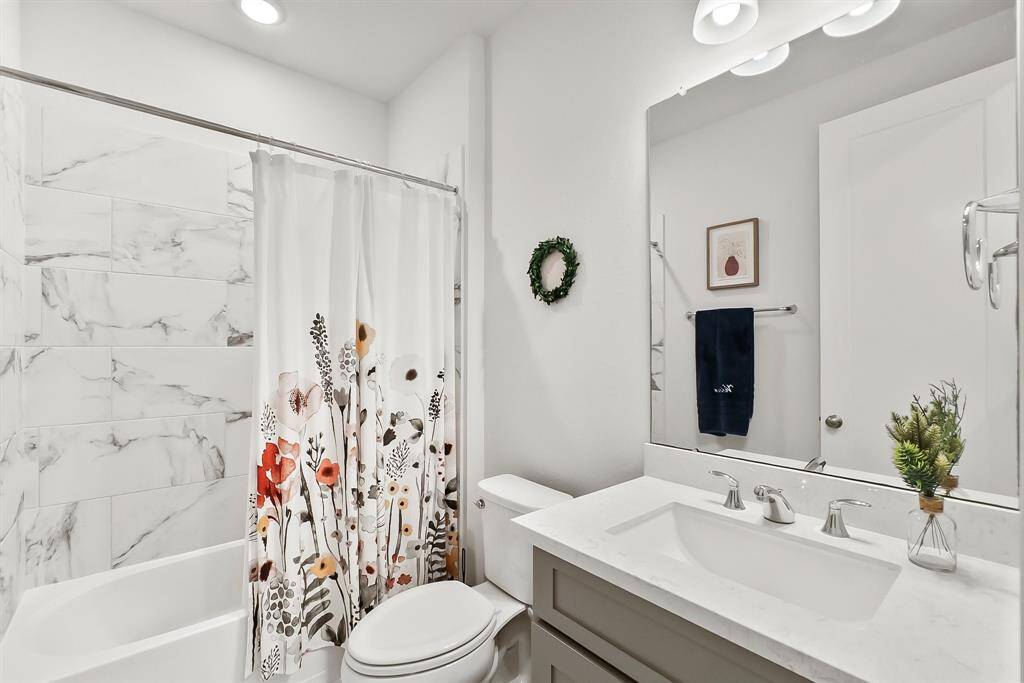 Full bathroom located downstairs and easy access for the secondary bedroom or guests.