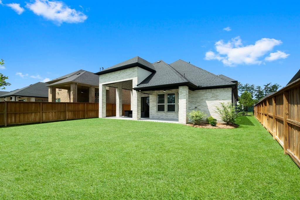 Two-tiered patio with endless outdoor living opportunities.