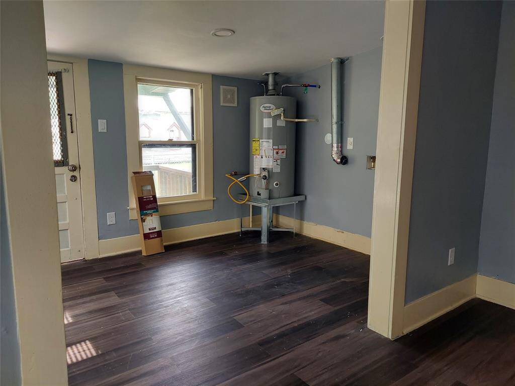 Huge utility room ! New gas hot water heater and washer dryer hookups.  And Gas dryer hookups.  Vinyl Floors recently installed.