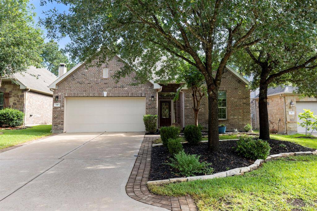 Welcome to 30 E Deer River Circle nestled in the sought-after neighborhood of Creekside Park. This meticulously kept one story home offers excellent curb appeal with raised beds and mature trees.