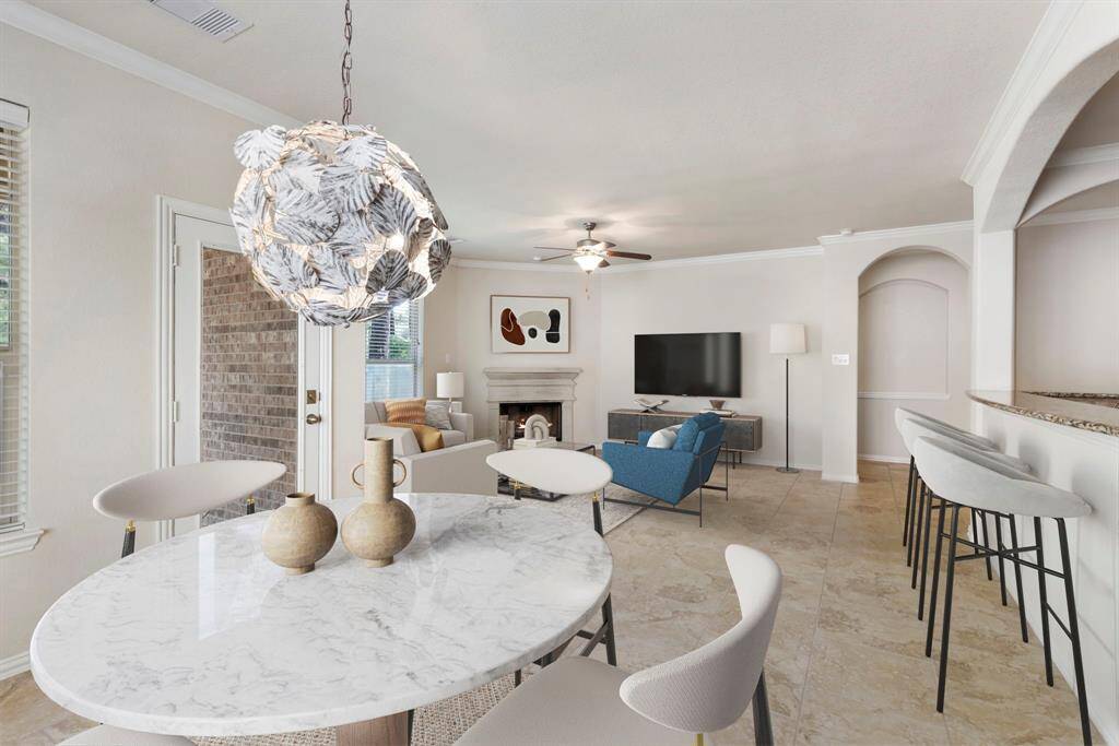 From the breakfast area, enjoy a seamless view into the spacious family room, creating a connected and open living environment ideal for entertaining or everyday comfort. *This image has been virtually staged.