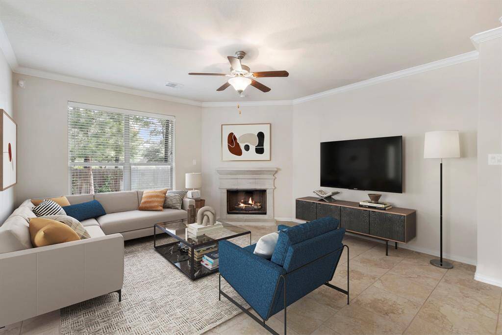 A generously sized window offers a lovely view of the backyard, bringing in natural light and a sense of openness to the space. * This image has been virtually staged.