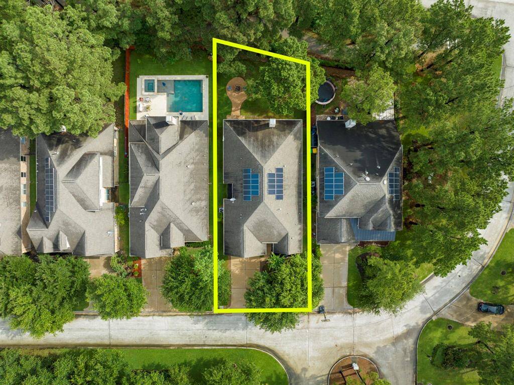 Adding to its unique appeal, the property backs to another home yet features a scenic walking trail, offering a blend of privacy and connection to nature—a rare find in any neighborhood.