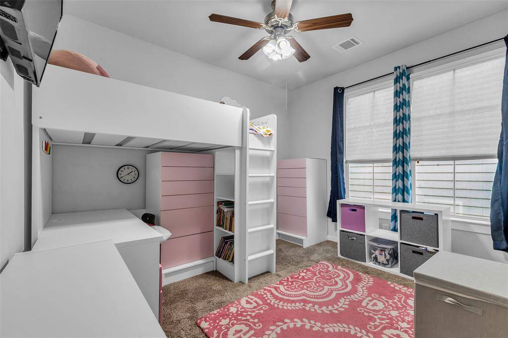Another secondary bedroom on the third floor, ready for you to personalize and make your own.