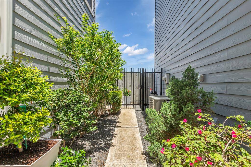 This entrance offers convenient secondary access to both the second primary bedroom and the back patio.