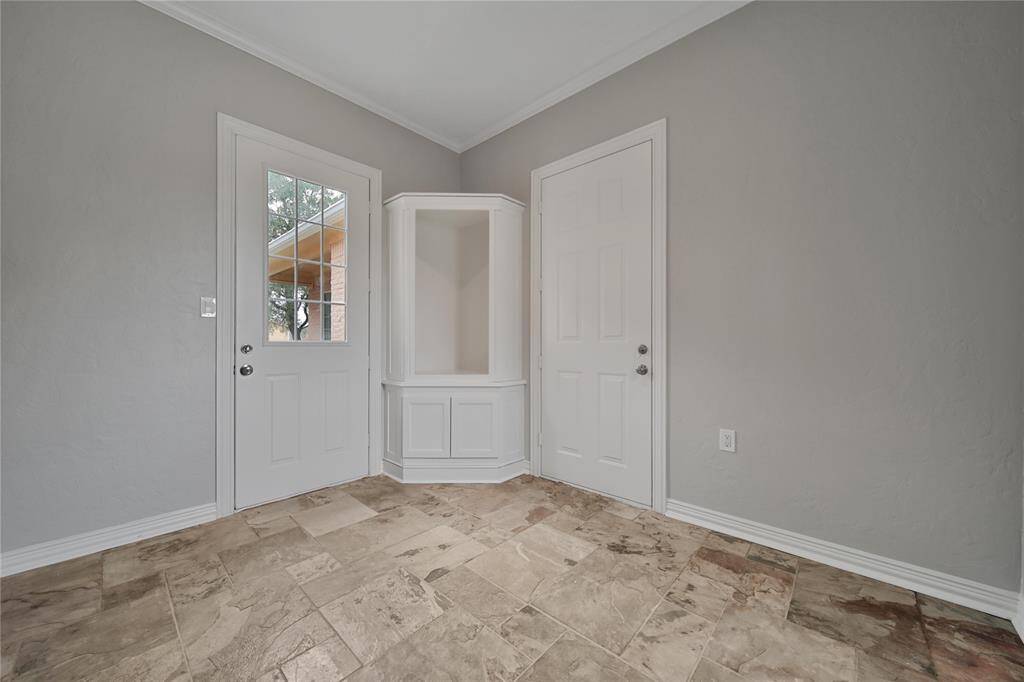 Private mud entrance that leads to home, garage and private separate guest quarters.