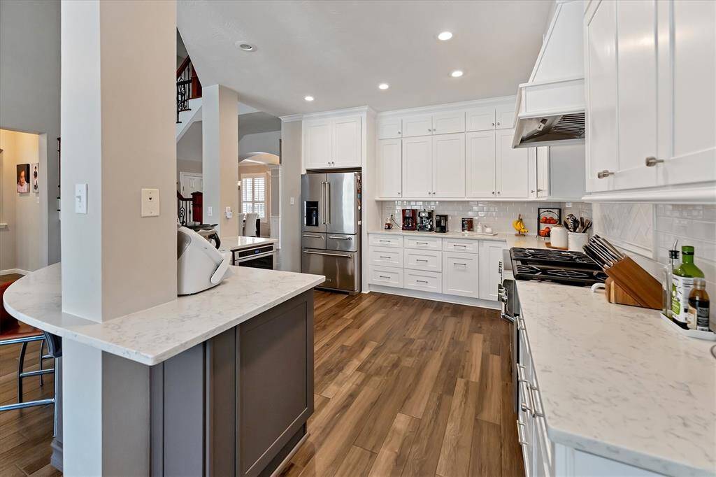 Shaker cabinets up to the ceiling