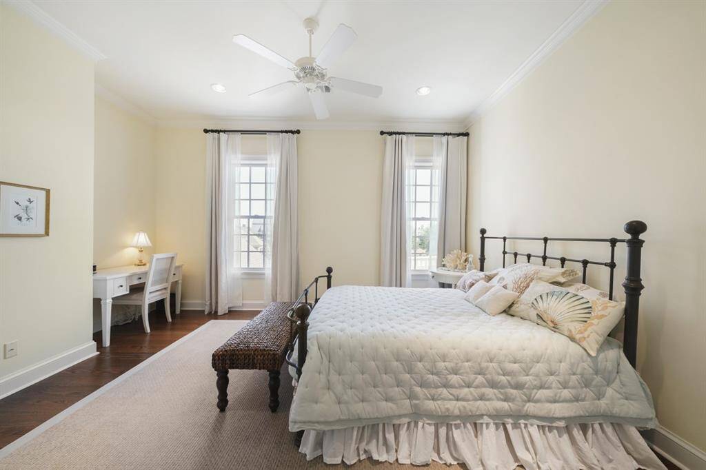 The first secondary bedroom on the 2nd floor has a specially designed nook for a writing desk. En suite bathroom and walk-in closet.
