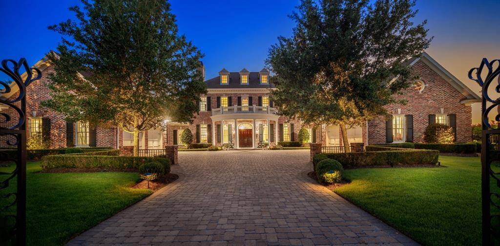 This home is one of the most photographed homes in East Shore and has been featured in various media for visual appeal and one-of-a-kind architecture. All the elements of the exterior facade and interior design were influenced by the historical homes built in Williamsburg and Richmond, VA along the James River in the 1920's by William Lawrence Bottomley, a renowned expert on Georgian architecture. Individually selected nearly century old brick is stamped with the year 1924.