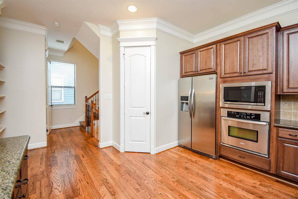 Open concept plan with a view of the pantry.
