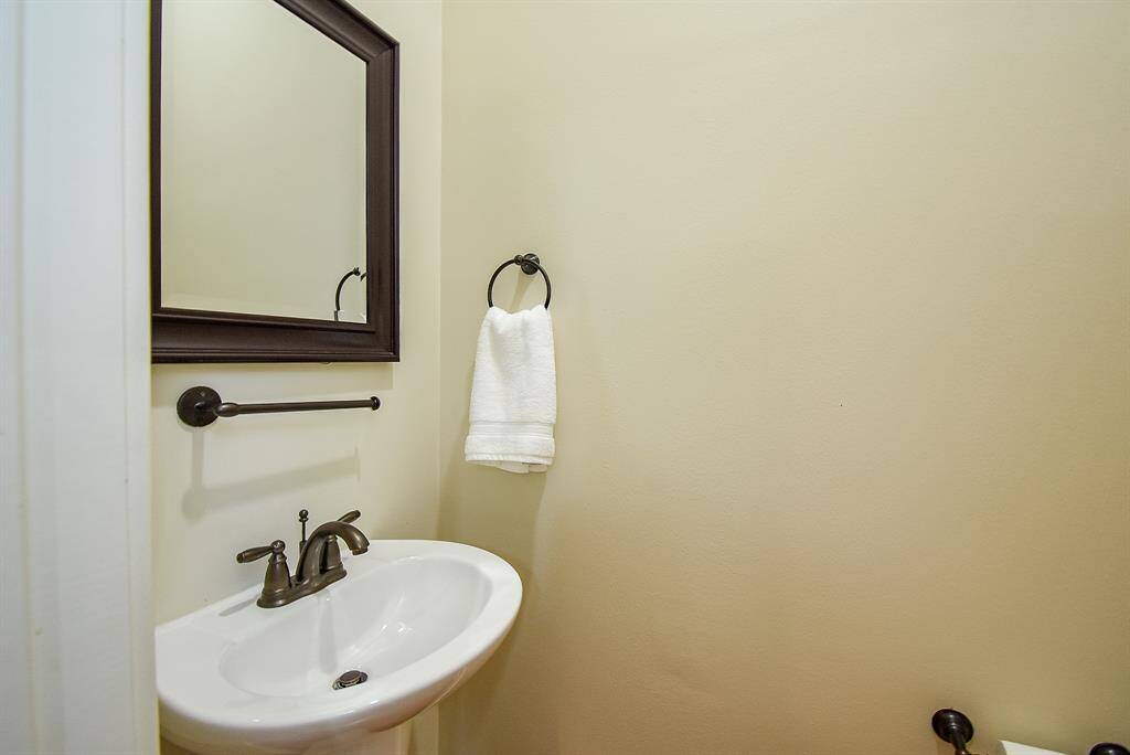 Half bath is located at the top of the second floor.