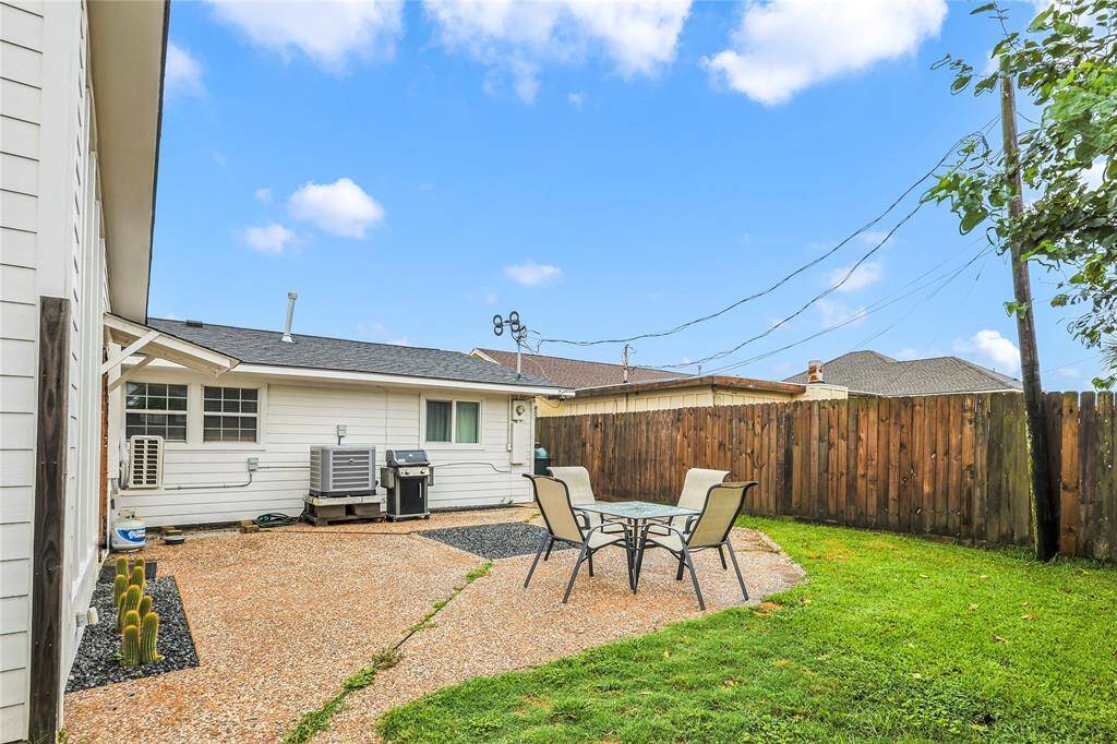 Entertain or relax in this low-maintenance outdoor living space right in the backyard.  This is a perfect spot for the summer barbecues!