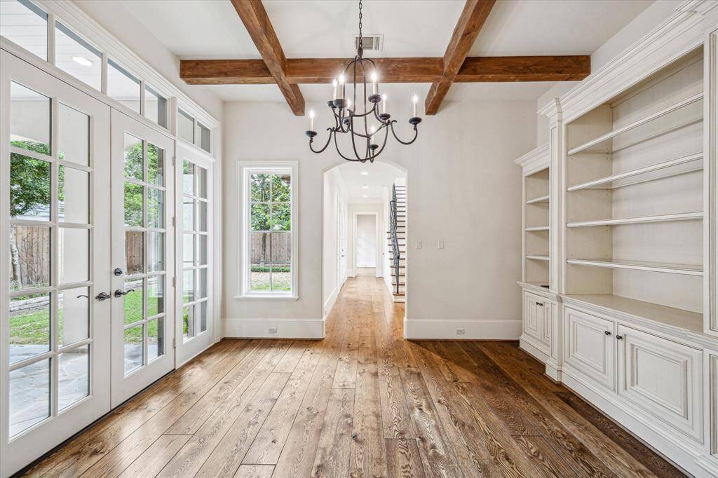 Wonderful morning room is located just off the kitchen and opens to a large covered patio and yard.