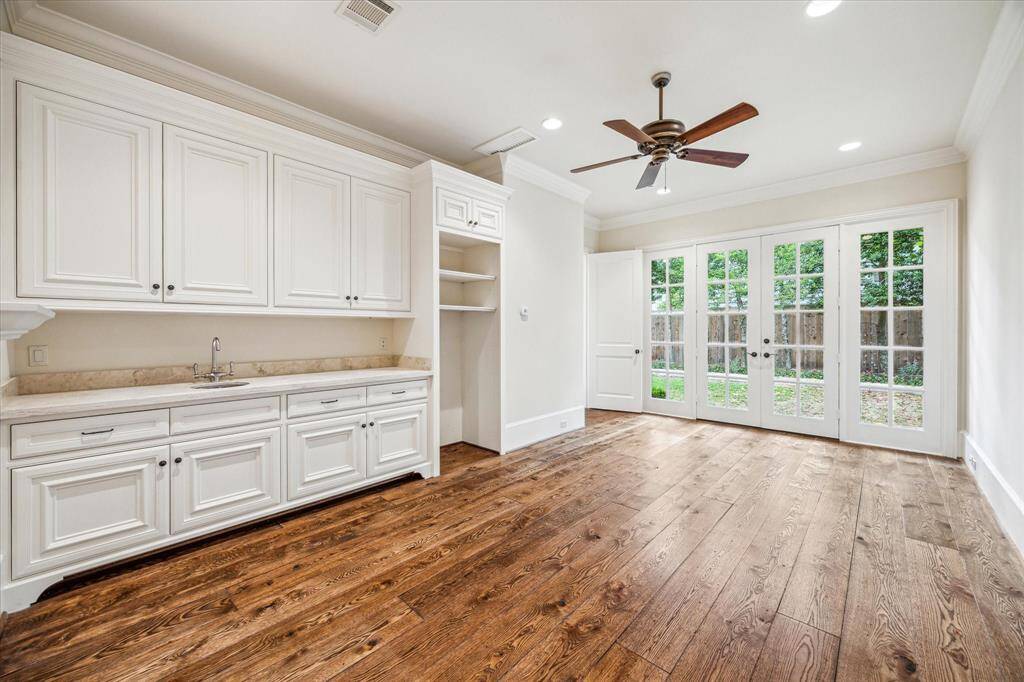 This downstairs flex room would be a wonderful gym, office or playroom.