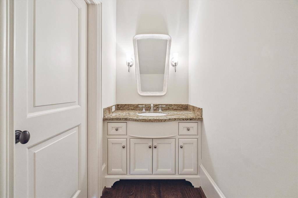 The downstairs features two lovely powder rooms.